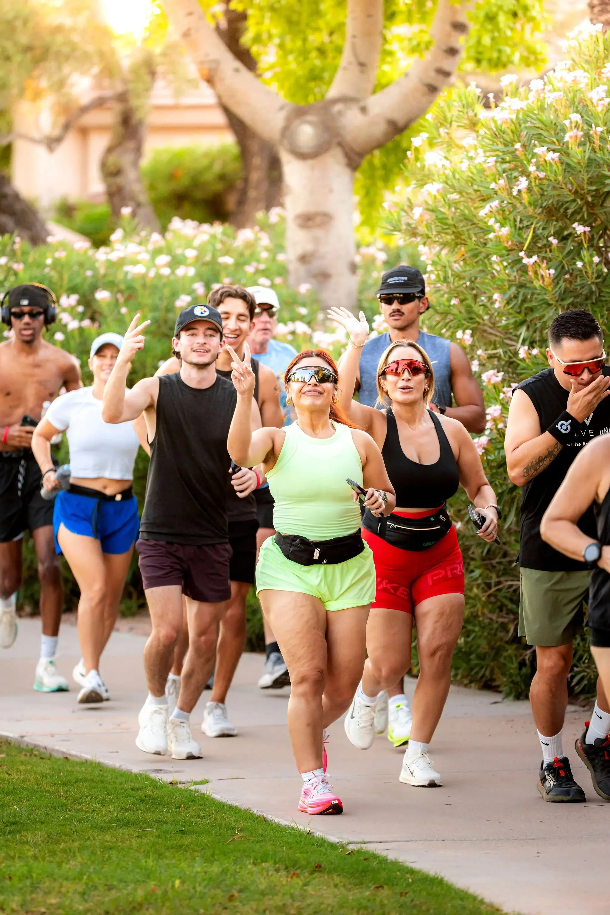 Runners jogging together on a sunny Scottsdale path