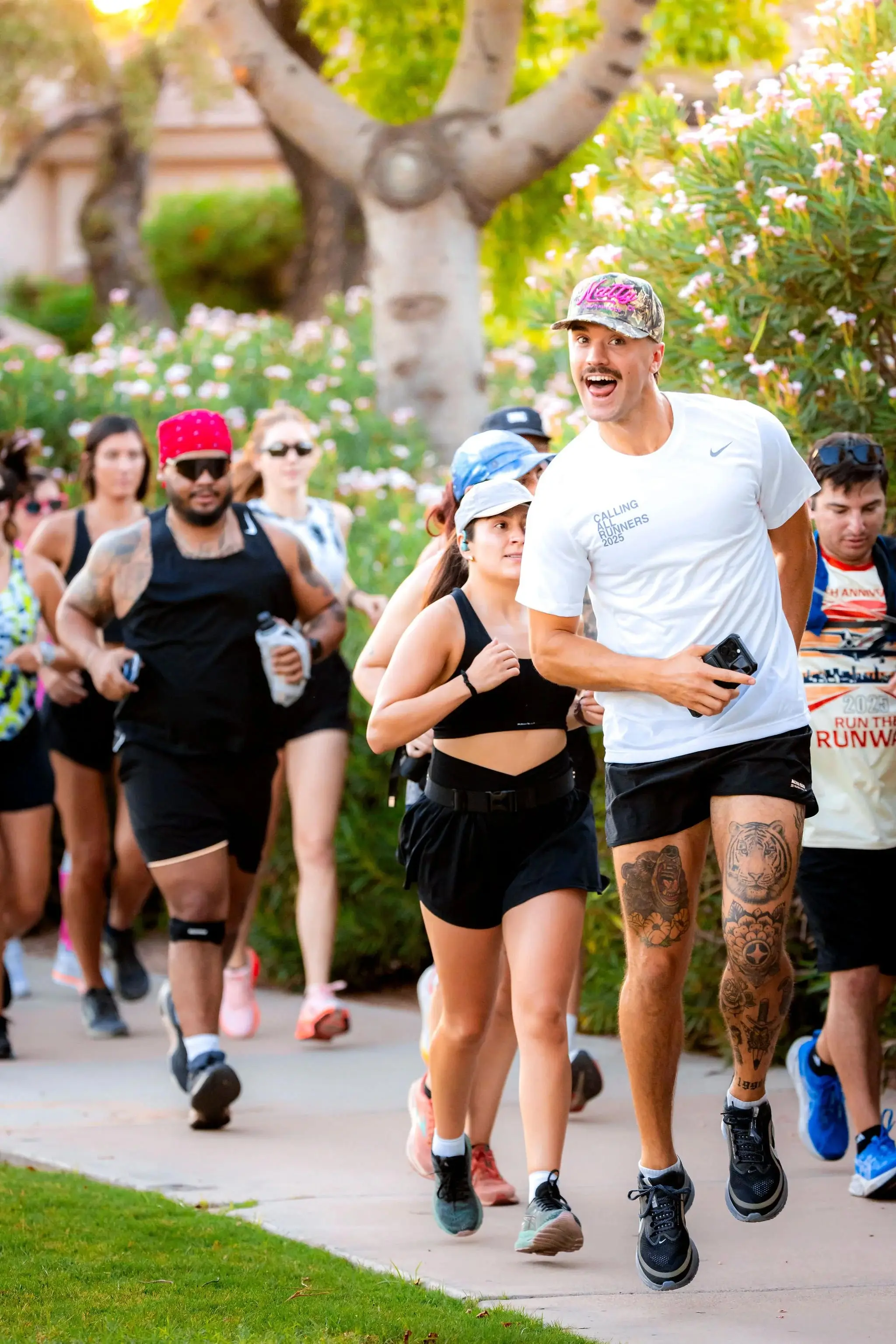 Runners on the Scottsdale Turkey Trot course with desert park views