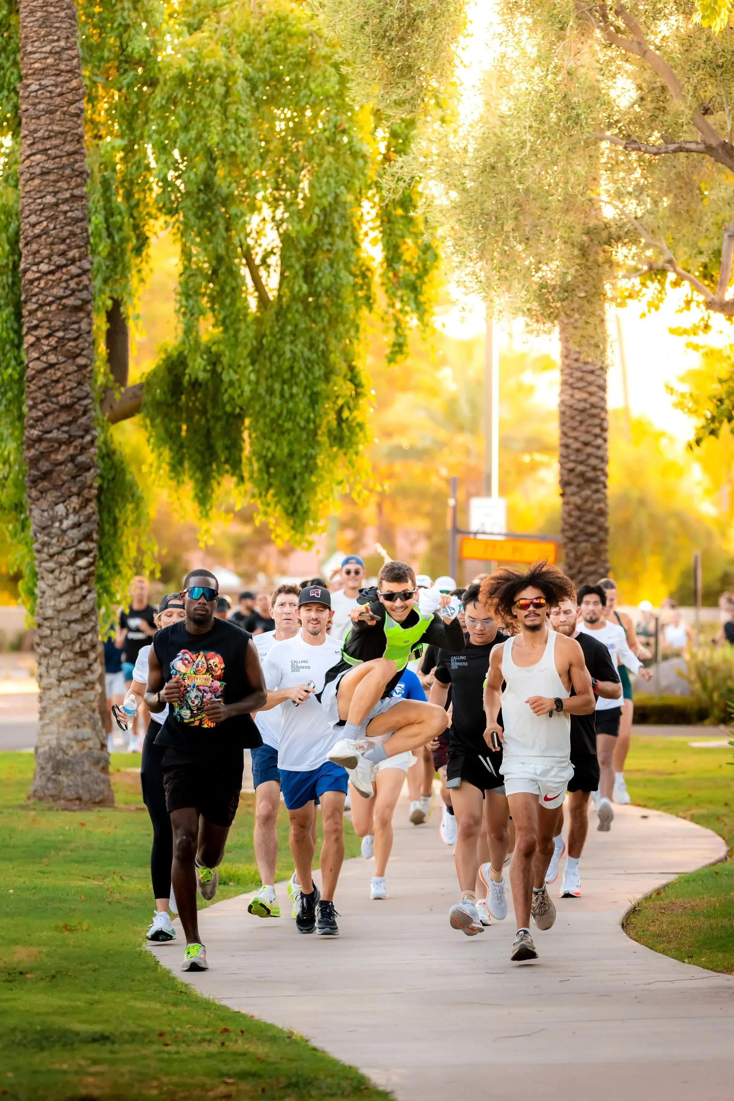 Runners on the course at golden hour